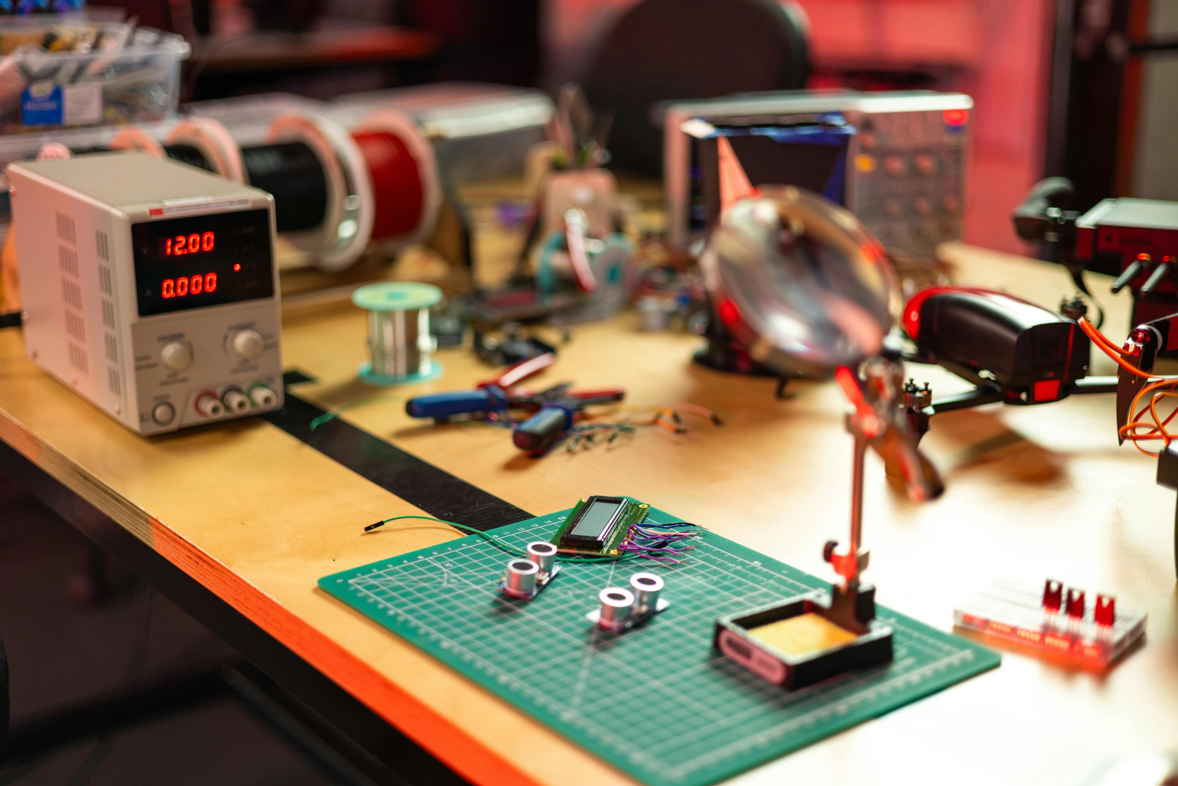 Orbis Electrica team collaborating over electronics and PCBs