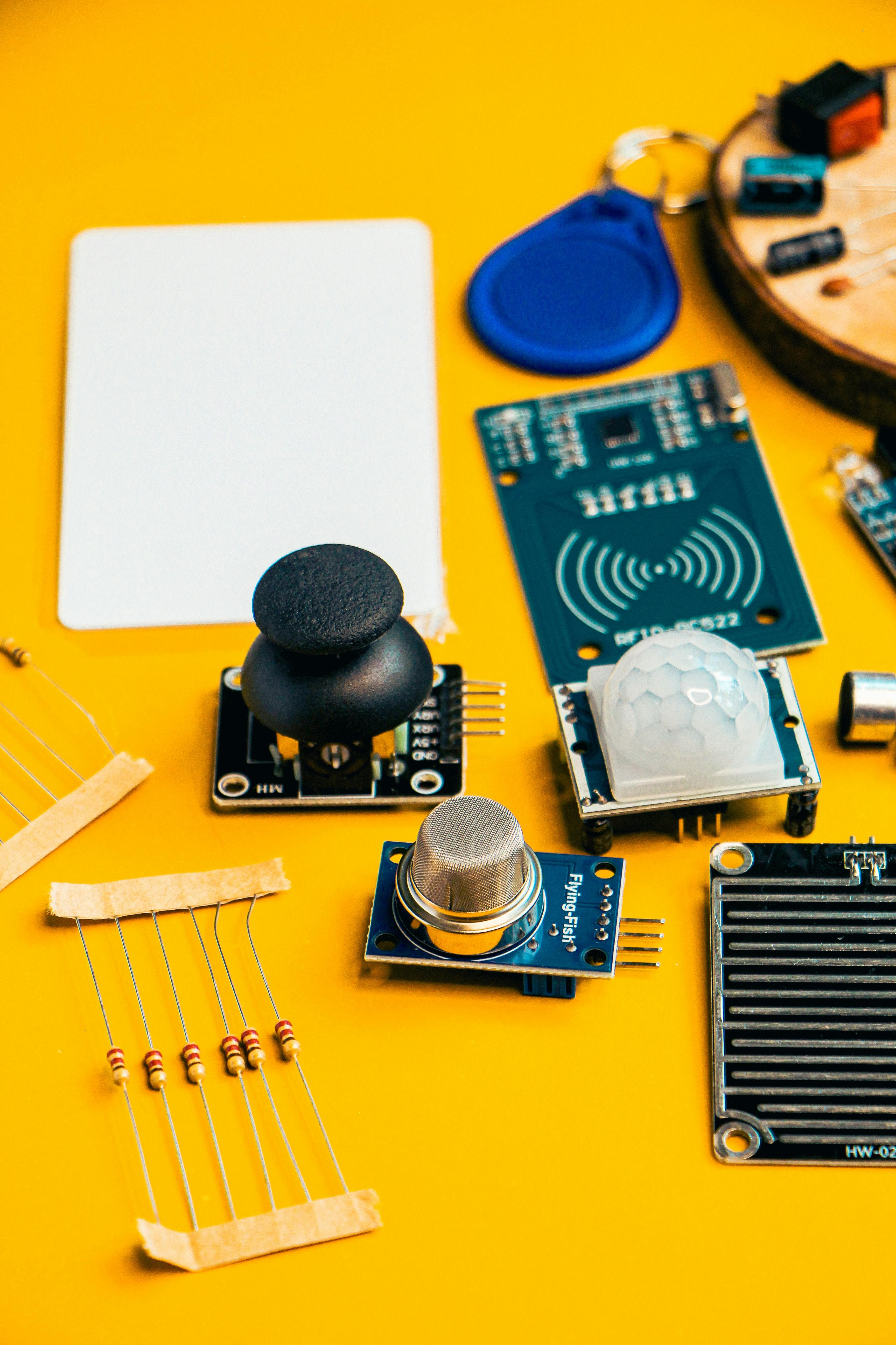 Engineers collaborating on schematic and PCB layout, with thermal and signal simulations on-screen